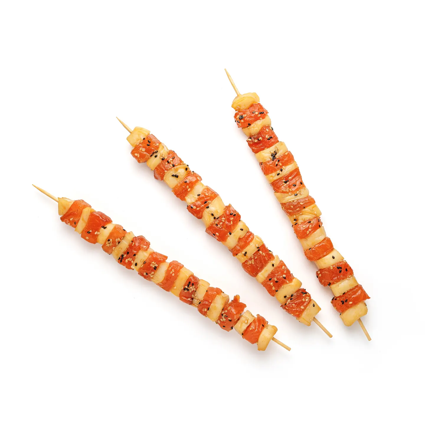Photograph of Salmon and squid skewers